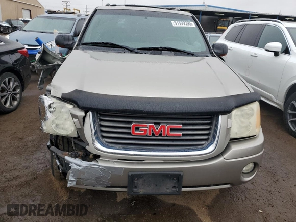 2002 GMC Envoy SLT with VIN 1GKDT13S222296226, listed as a Copart auction lot 51599295 with 148,653 mi miles and Salvage Title. Bid and sale history available at carsss.com. Image 5.