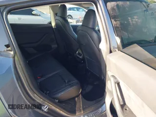 2023 Tesla Model Y Long Range z VIN 7SAYGDEE5PA099226, wystawiony jako IAAI lot #42004061 z przebiegiem 10 607 mil mil oraz . Historia ofert i sprzedaży dostępna na DreamBid. Obrazek 8.