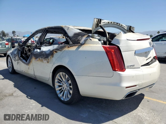 2014 Cadillac CTS Performance RWD с VIN 1G6AS5S35E0130174, выставлен на аукционе Copart как лот 61251475 с пробегом Не указан миль и На запчасти • Non repairable. История ставок и продаж доступна на DreamBid. Изображение 2.