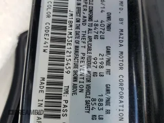2014 Mazda 3 S Grand Touring with VIN JM1BM1M33E1215459, listed as a Copart auction lot 59188005 with Not provided miles and Salvage title. Bid and sale history available at DreamBid. Image 12.