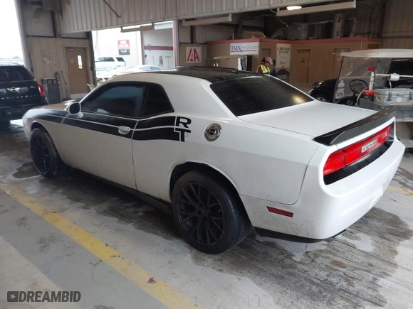 2011 Dodge Challenger with VIN 2B3CJ4DGXBH558348, listed as a IAAI auction lot 41532603 with 127,551 mi miles. Bid and sale history available at carsss.com. Image 3.