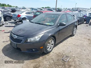 2014 Chevrolet Cruze LS with VIN 1G1PA5SGXE7186074, listed as a IAAI auction lot 42302567 with 152,927 mi miles and . Bid and sale history available at DreamBid. Image 2.