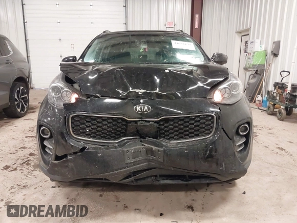 2019 Kia Sportage EX with VIN KNDPNCAC0K7606712, listed as a IAAI auction lot 41652131 with 71,013 mi miles. Bid and sale history available at carsss.com. Image 12.