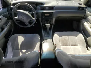 1999 Toyota Camry LE с VIN JT2BG22KXX0284593, выставлен на аукционе Copart как лот 54061685 с пробегом 229 047 миль миль и Списание • Salvage title. История ставок и продаж доступна на DreamBid. Изображение 8.
