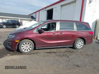 2018 Honda Odyssey EX-L with VIN 5FNRL6H73JB028770, listed as a IAAI auction lot 41984094 with 96,819 mi miles and . Bid and sale history available at DreamBid. Image 13.