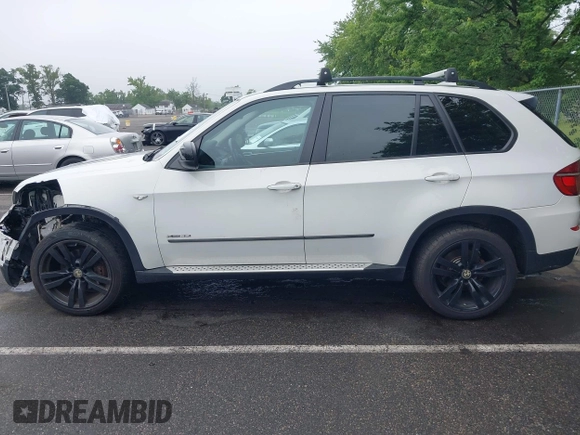 2012 BMW X5 35i с VIN 5UXZV4C5XCL765368, выставлен на аукционе IAAI как лот 42526136 с пробегом 165 365 миль миль и . История ставок и продаж доступна на DreamBid. Изображение 14.