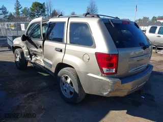 2006 Jeep Grand Cherokee Laredo with VIN 1J4GS48KX6C193586, listed as a IAAI auction lot 41260951 with 215,429 mi miles. Bid and sale history available at carsss.com. Image 3.