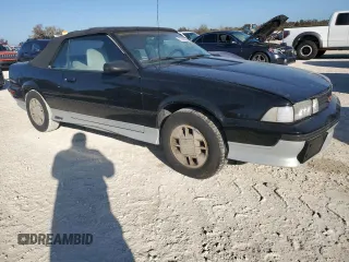 1989 Chevrolet Cavalier with VIN 1G1JF31W1K7190840, listed as a Copart auction lot 77747934 with Not Provided miles and Salvage Title. Bid and sale history available at DreamBid. Image 4.