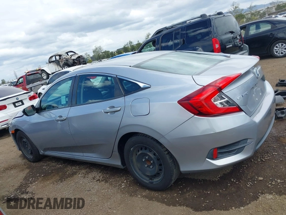 2018 Honda Civic LX with VIN 2HGFC2F50JH500559, listed as a IAAI auction lot 42040271 with 82,026 mi miles and . Bid and sale history available at DreamBid. Image 14.