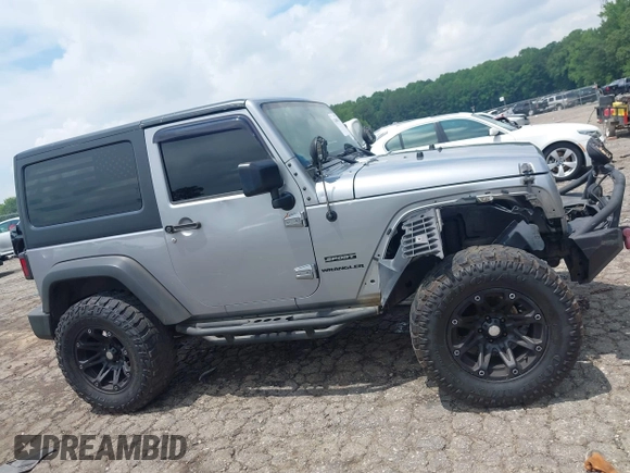 2016 Jeep Wrangler Black Bear with VIN 1C4AJWAG5GL258426, listed as a IAAI auction lot 42400914 with 128,606 mi miles and . Bid and sale history available at DreamBid. Image 13.