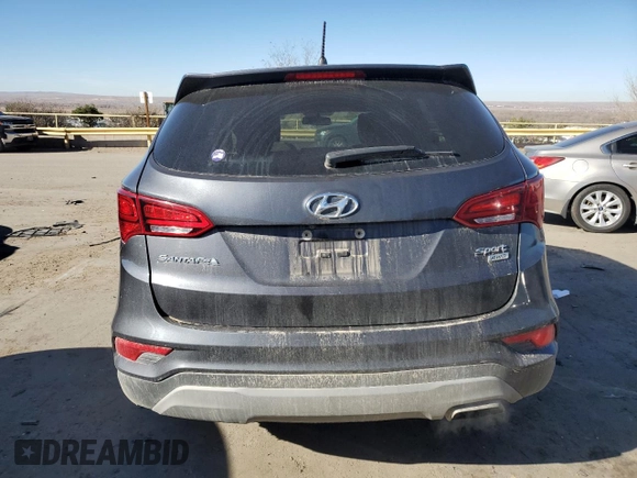 2018 Hyundai Santa Fe 2.4L z VIN 5XYZTDLB5JG568579, wystawiony jako Copart lot #82534794 z przebiegiem 130 032 mil mil oraz Szkoda całkowita • Salvage title. Historia ofert i sprzedaży dostępna na DreamBid. Obrazek 6.