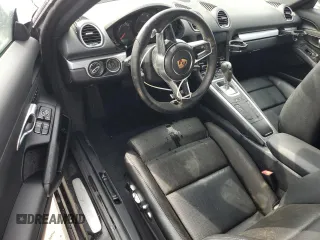 2018 Porsche 718 Cayman z VIN WP0AA2A88JK261609, wystawiony jako Copart lot #77961894 z przebiegiem Nie podano mil oraz Nie do naprawy • Non repairable. Historia ofert i sprzedaży dostępna na DreamBid. Obrazek 8.