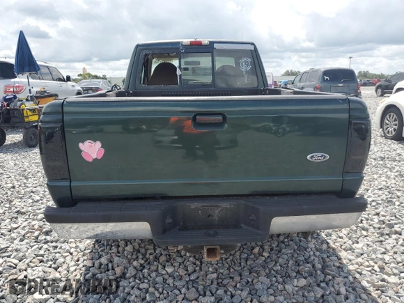 2002 Ford Ranger XLT Appearance with VIN 1FTYR44E42TA32828, listed as a Copart auction lot 60205715 with 290,846 mi miles and Salvage title. Bid and sale history available at DreamBid. Image 6.