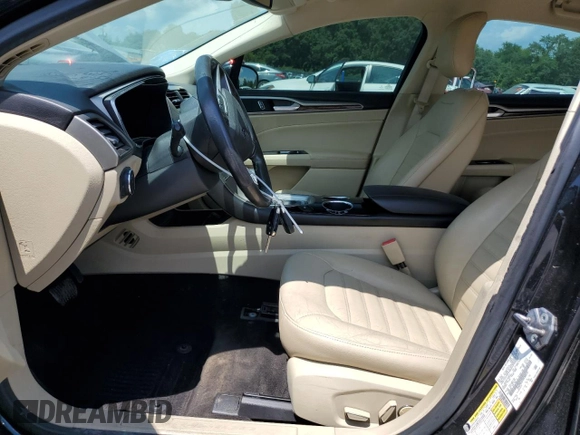 2013 Ford Fusion SE Hybrid with VIN 3FA6P0LU7DR288731, listed as a Copart auction lot 63902215 with 124,176 mi miles and Salvage title. Bid and sale history available at DreamBid. Image 7.