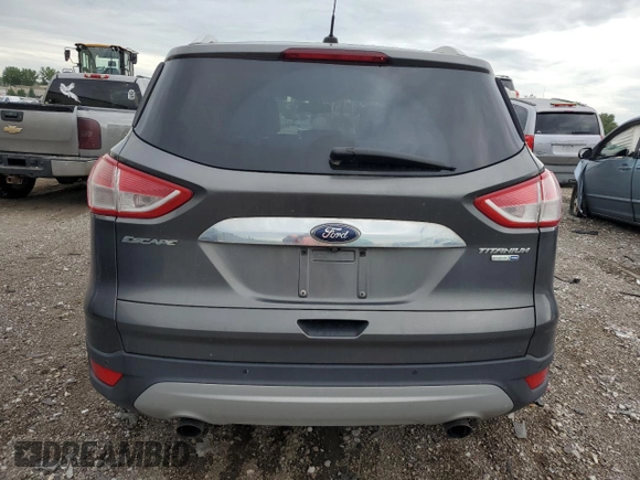 2015 Ford Escape Titanium with VIN 1FMCU9J96FUB32972, listed as a Copart auction lot 62886145 with 215,769 mi miles and Salvage title. Bid and sale history available at DreamBid. Image 6.