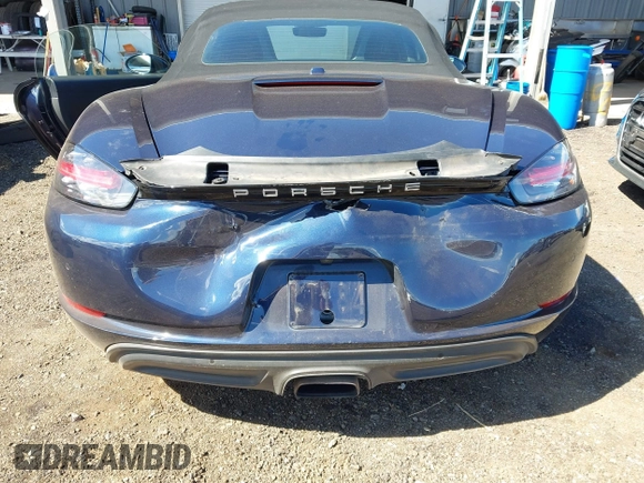 2018 Porsche 718 Boxster z VIN WP0CA2A8XJS210766, wystawiony jako IAAI lot #41617239 z przebiegiem 55 336 mil mil oraz . Historia ofert i sprzedaży dostępna na DreamBid. Obrazek 6.