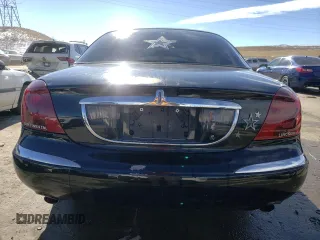 1998 Lincoln Continental with VIN 1LNFM97V7WY637848, listed as a Copart auction lot 43510885 with 141,796 mi miles and Salvage Title. Bid and sale history available at carsss.com. Image 6.