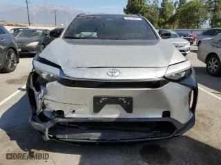 2024 Toyota bZ4X XLE with VIN JTMAAAAA3RA032205, listed as a Copart auction lot 68753654 with 7,898 mi miles and Salvage Title. Bid and sale history available at carsss.com. Image 5.