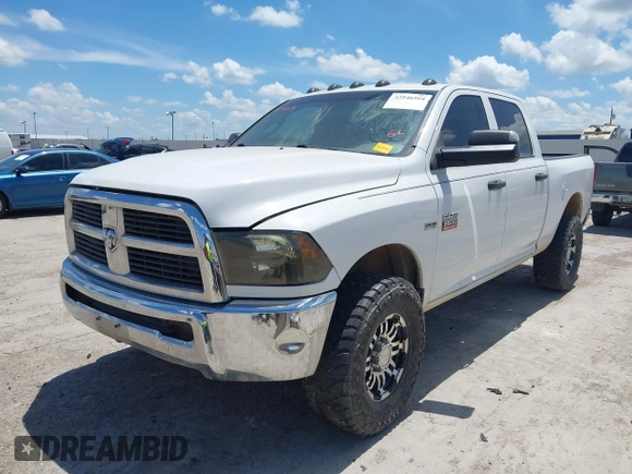 2012 Ram 2500 ST with VIN 3C6TD5CT8CG198855, listed as a IAAI auction lot 42546504 with 290,000 mi miles and . Bid and sale history available at DreamBid. Image 2.