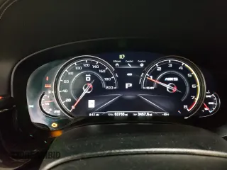 2018 BMW M5 z VIN WBSJF0C51JB282271, wystawiony jako Copart lot #60647265 z przebiegiem 63 765 mil mil oraz Szkoda całkowita • Salvage title. Historia ofert i sprzedaży dostępna na DreamBid. Obrazek 9.