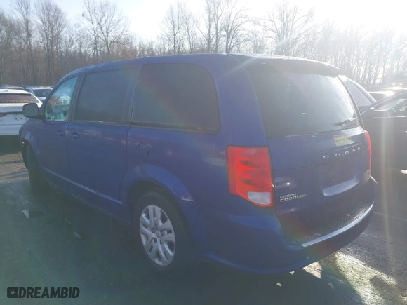 2018 Dodge Grand Caravan SE with VIN 2C4RDGBG8JR363409, listed as a IAAI auction lot 41129214 with 101,143 mi miles. Bid and sale history available at carsss.com. Image 3.
