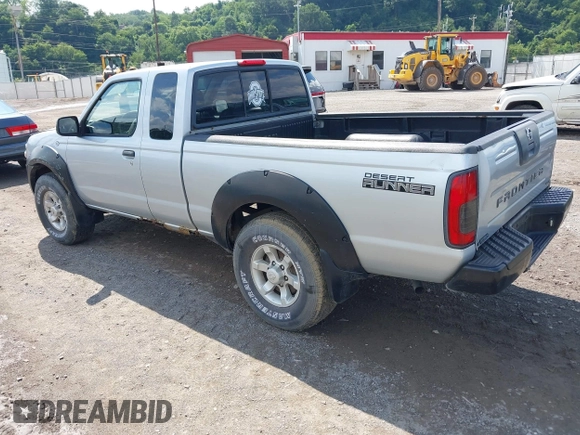 2001 Nissan Frontier SE Desert Runner z VIN 1N6ED26T61C303868, wystawiony jako IAAI lot #42698412 z przebiegiem 223 551 mil mil oraz . Historia ofert i sprzedaży dostępna na DreamBid. Obrazek 3.