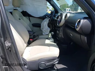 2012 MINI Countryman S with VIN WMWZC3C53CWL83664, listed as a IAAI auction lot 42062673 with 102,615 mi miles and . Bid and sale history available at DreamBid. Image 5.