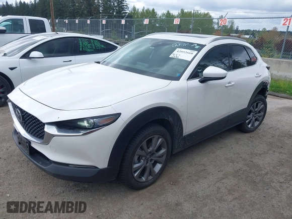 2023 Mazda CX-30 2.5 S Premium Package with VIN 3MVDMBDM7PM522287, listed as a IAAI auction lot 42052660 with 41,336 mi miles. Bid and sale history available at carsss.com. Image 17.