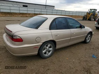 1998 Cadillac Catera z VIN W06VR52R5WR028774, wystawiony jako Copart lot #78085484 z przebiegiem 104 609 mil mil oraz Szkody całkowita. Historia ofert i sprzedaży dostępna na DreamBid. Obrazek 3.