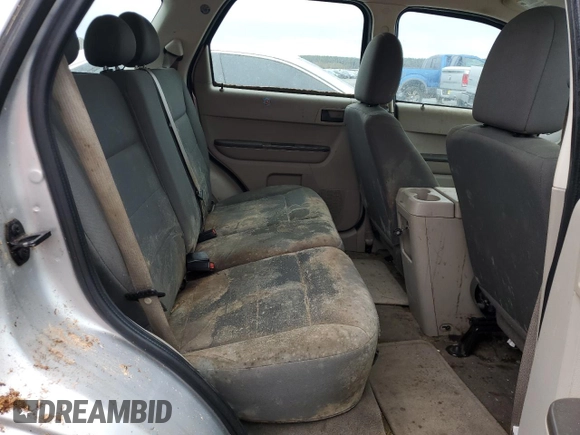 2009 Ford Escape XLS with VIN 1FMCU02779KB55136, listed as a Copart auction lot 81513864 with 108,906 mi miles and Salvage title. Bid and sale history available at DreamBid. Image 11.