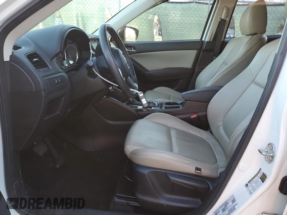 2016 Mazda CX-5 Sport with VIN JM3KE2BY3G0877107, listed as a Copart auction lot 87621635 with 83,093 mi miles and Salvage Title. Bid and sale history available at carsss.com. Image 7.