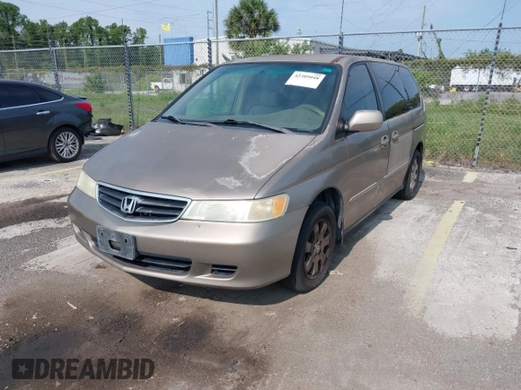 2004 Honda Odyssey EX-L z VIN 5FNRL18954B014748, wystawiony jako IAAI lot #42389048 z przebiegiem 136 176 mil mil oraz . Historia ofert i sprzedaży dostępna na DreamBid. Obrazek 2.