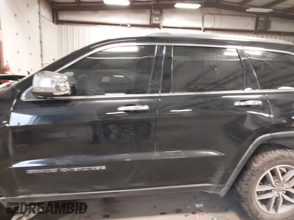 2021 Jeep Grand Cherokee 80th Anniversary with VIN 1C4RJFBG5MC732694, listed as a IAAI auction lot 41410124 with 84,958 mi miles and . Bid and sale history available at DreamBid. Image 15.