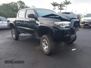 2019 Toyota Tacoma SR with VIN 3TMCZ5AN4KM271105, listed as a IAAI auction lot 41752706 with 61,122 mi miles and . Bid and sale history available at DreamBid. Image 1.