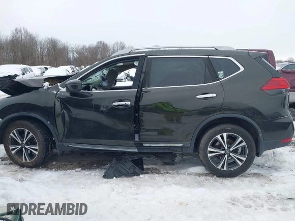 2017 Nissan Rogue SL with VIN 5N1AT2MT0HC813372, listed as a IAAI auction lot 41215661 with 109,101 mi miles and . Bid and sale history available at DreamBid. Image 14.