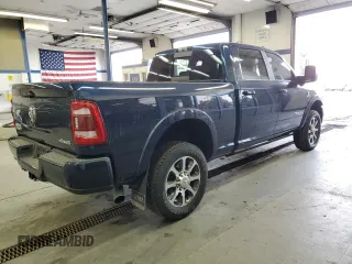 2023 Ram 2500 Longhorn with VIN 3C6UR5GL4PG646451, listed as a Copart auction lot 77141314 with 9,852 mi miles and Salvage Title. Bid and sale history available at carsss.com. Image 3.