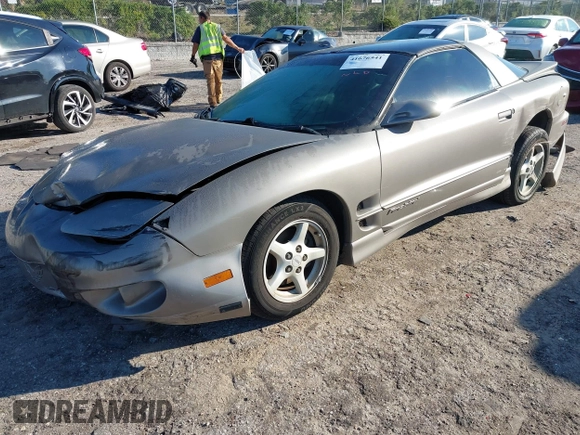 2000 Pontiac Firebird Firebird z VIN 2G2FS22K0Y2112410, wystawiony jako IAAI lot #41676541 z przebiegiem 129 857 mil mil oraz . Historia ofert i sprzedaży dostępna na DreamBid. Obrazek 17.