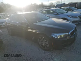 2018 BMW 5 Series 530i xDrive with VIN WBAJA7C5XJG907362, listed as a Copart auction lot 86715344 with 117,665 mi miles and Salvage title. Bid and sale history available at DreamBid. Image 4.