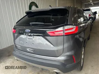 2021 Ford Edge Titanium z VIN 2FMPK3K97MBA51131, wystawiony jako IAAI lot #42529673 z przebiegiem 92 302 mil mil oraz . Historia ofert i sprzedaży dostępna na DreamBid. Obrazek 4.