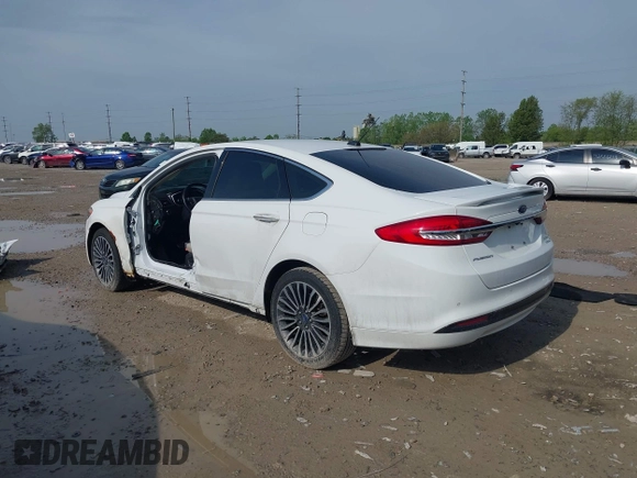 2018 Ford Fusion Titanium with VIN 3FA6P0RU2JR246812, listed as a IAAI auction lot 42157030 with 168,680 mi miles and . Bid and sale history available at DreamBid. Image 3.
