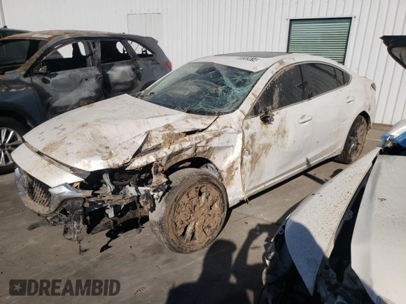 2021 Mazda 6 Sport with VIN JM1GL1UM0M1600168, listed as a Copart auction lot 84118174 with Not Provided miles and Salvage Title. Bid and sale history available at carsss.com. Image 1.