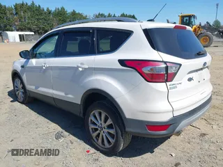 2017 Ford Escape Titanium with VIN 1FMCU9J96HUE21191, listed as a IAAI auction lot 42006013 with 71,786 mi miles. Bid and sale history available at carsss.com. Image 3.
