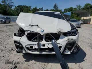 2019 BMW X4 M40i z VIN 5UXUJ5C57KLJ63215, wystawiony jako Copart lot #55150835 z przebiegiem Nie podano mil oraz Szkody całkowita. Historia ofert i sprzedaży dostępna na DreamBid. Obrazek 5.