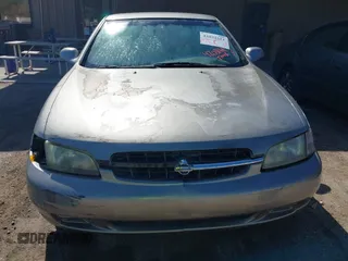 1999 Nissan Altima XE with VIN 1N4DL01D5XC124936, listed as a IAAI auction lot 42031611 with 140,519 mi miles. Bid and sale history available at carsss.com. Image 6.