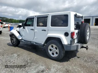 2013 Jeep Wrangler Unlimited Sahara with VIN 1C4HJWEG1DL516784, listed as a Copart auction lot 56382805 with 205,874 mi miles and Salvage title. Bid and sale history available at DreamBid. Image 2.