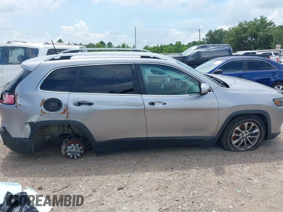 2019 Jeep Cherokee Altitude with VIN 1C4PJLLB5KD151339, listed as a IAAI auction lot 42755601 with 92,878 mi miles and . Bid and sale history available at DreamBid. Image 13.