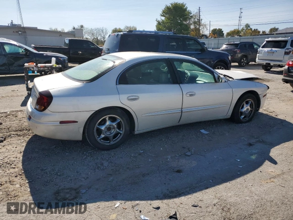2003 Oldsmobile Aurora z VIN 1G3GS64C034160957, wystawiony jako Copart lot #76566524 z przebiegiem Nie podano mil oraz Szkoda całkowita • Salvage title. Historia ofert i sprzedaży dostępna na DreamBid. Obrazek 3.
