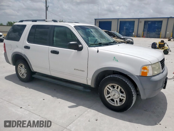 2002 Ford Explorer XLS with VIN 1FMZU62E62UA69368, listed as a Copart auction lot 61571065 with 124,095 mi miles and Salvage title. Bid and sale history available at DreamBid. Image 4.