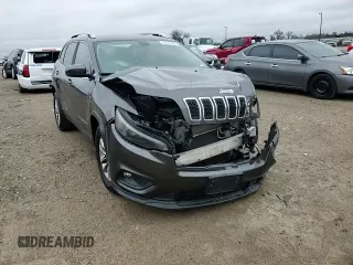 2020 Jeep Cherokee Latitude Plus with VIN 1C4PJLLB0LD605854, listed as a Copart auction lot 44743905 with 112,637 mi miles and Salvage Title. Bid and sale history available at carsss.com. Image 12.