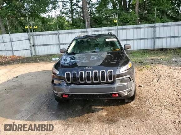 2015 Jeep Cherokee Trailhawk z VIN 1C4PJMBS6FW652001, wystawiony jako Copart lot #62344785 z przebiegiem 165 473 mil mil oraz Szkoda całkowita • Salvage title. Historia ofert i sprzedaży dostępna na DreamBid. Obrazek 14.